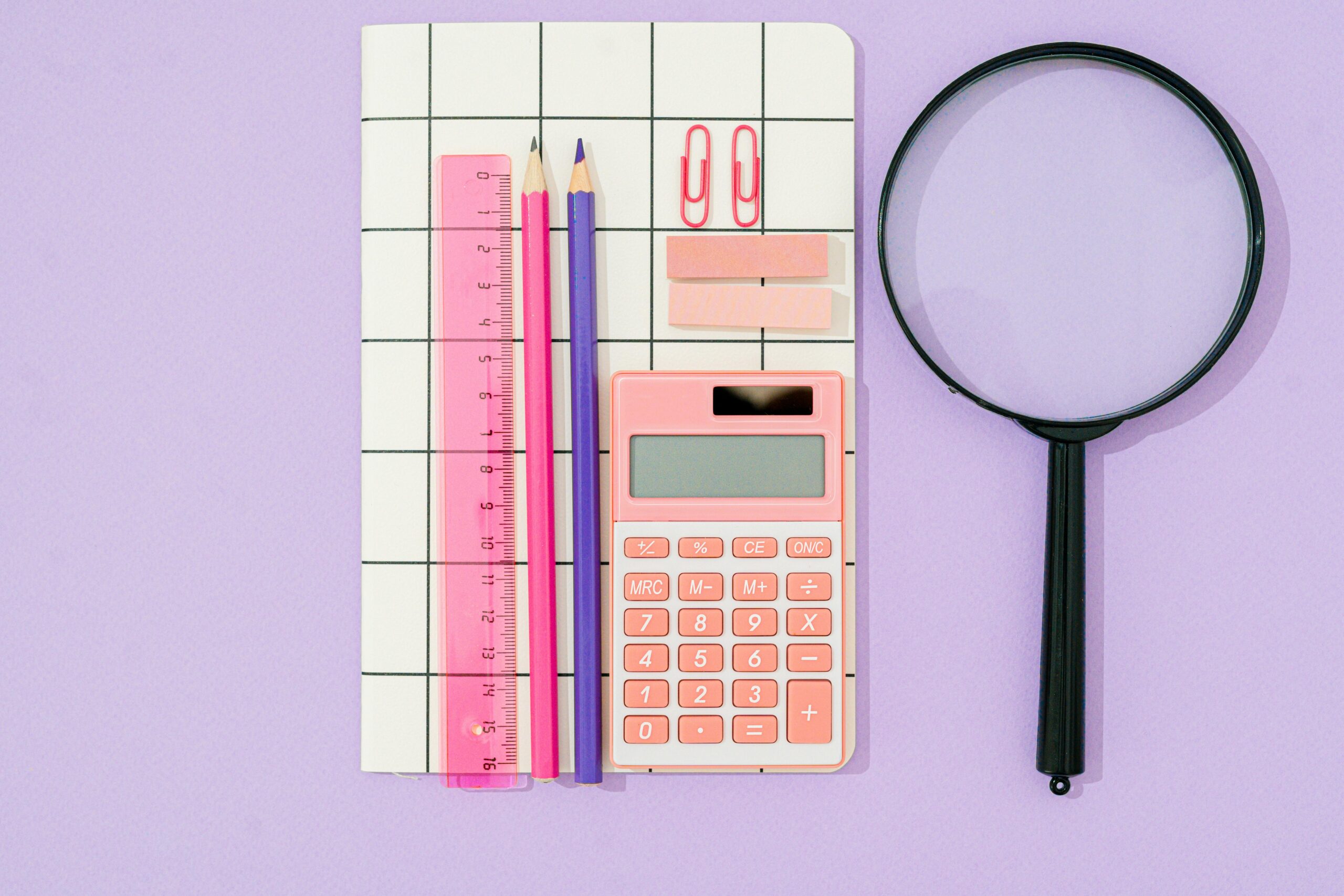 Photo by SHVETS production: https://www.pexels.com/photo/a-magnifying-glass-beside-the-notebook-9743168/